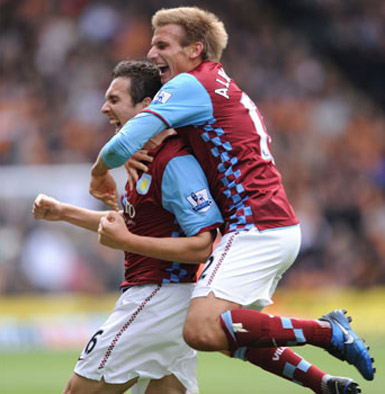 Aston Villa's Stewart Downing celebrates scoring the first goal for his side with team mate Marc Albrighton
